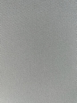 Fondo de textura de tejido t&eacute;cnico de malla gris claro con patr&oacute;n trenzado uniforme y transpirable, ideal para conceptos de dise&ntilde;o deportivo, textil y tecnol&oacute;gico