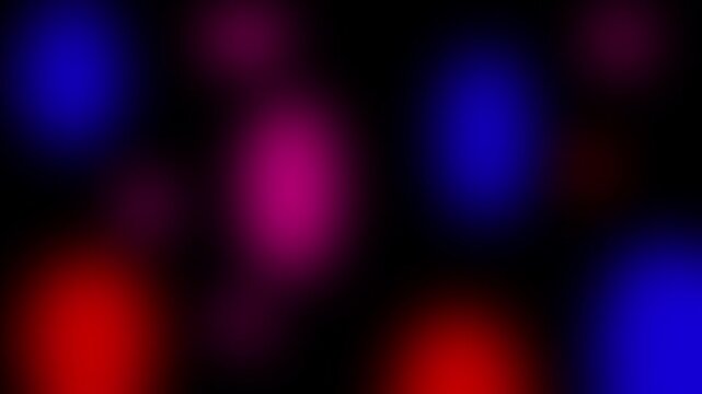 Dark background with colorful glowing Booker circles animation red purple blue blurred light dots motion graphic animation.