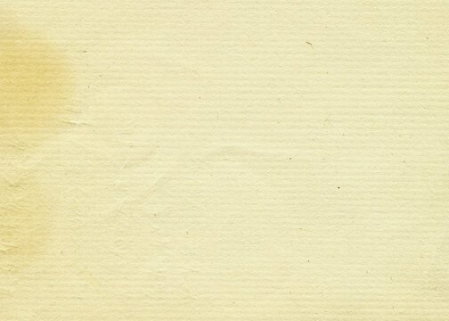 Retro photo paper texture. Recycle vintage stained paper background with copy space. Aged and yellowed dirty paper.
