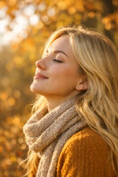 Woman enjoying autumn portrait with closed eyes and serene expression for fall lifestyle background and wellness banner