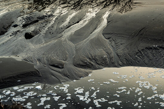 Patterns in the sand on Oregon beach