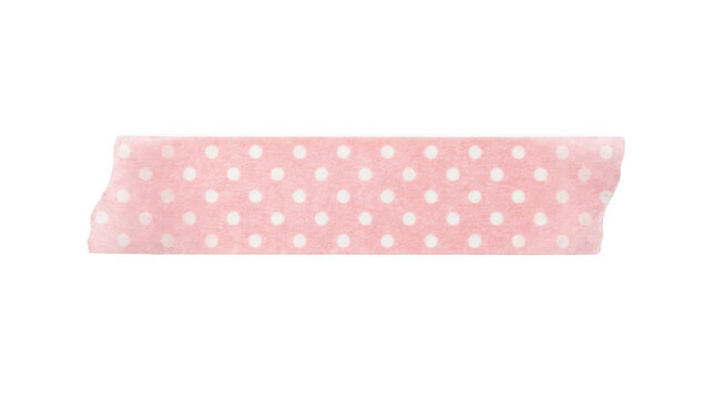 Pink polka dot washi tape strip with torn edges isolated on transparent background