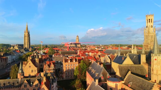 Aerial view of Bruges city with De Burg square during sunrise Belgium