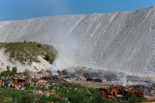 View of the Jagnjilo waste disposal site with burning trash and a large pile of mining waste in Pljevlja, Pljevlja Municipality, Montenegro.