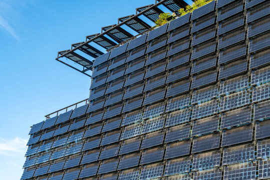 View of solar panels covering futuristic building facade and roof in the Netherlands