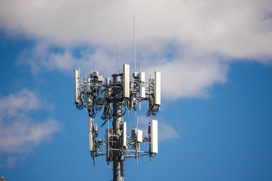 Close-Up Cellular Antenna Array Against Blue Sky