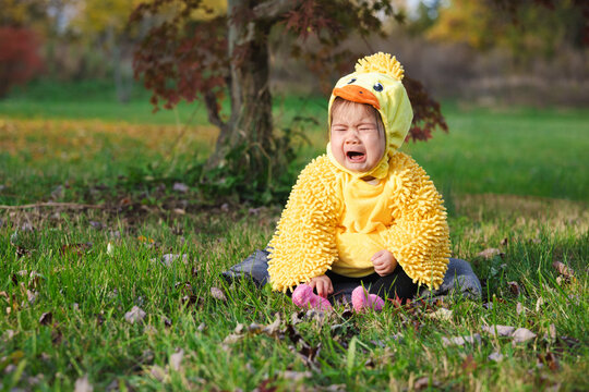 Crying Toddler in Yellow Duck Costume on Halloween