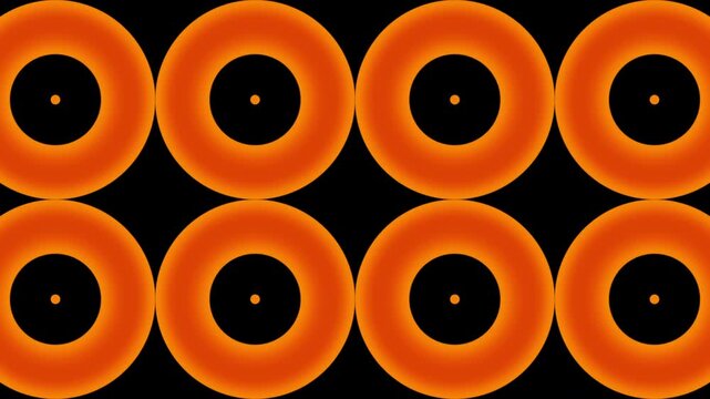 A seamless loop bold retro geometric pattern of concentric circles in warm orange, yellow, and brown tones. 1970 design vintage