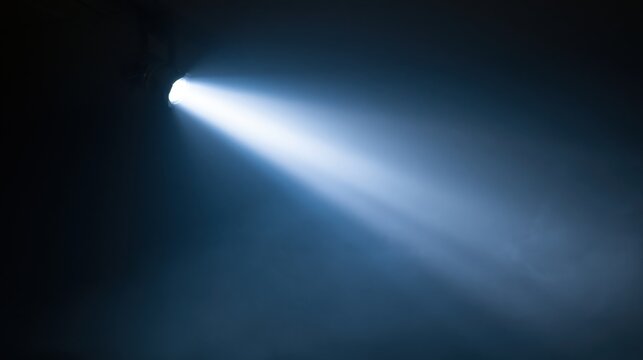 The Beam of Light Through Mist Illuminating a Dark Atmospheric Chamber