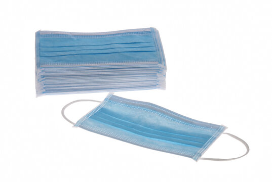 Stack of Blue Disposable Surgical Face Masks
