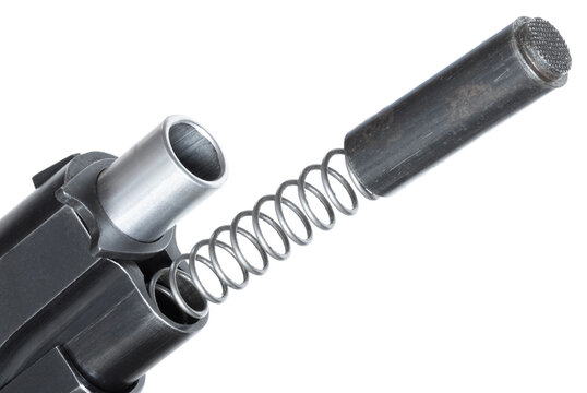 Barrel bushing moved on a pistol to release the recoil spring