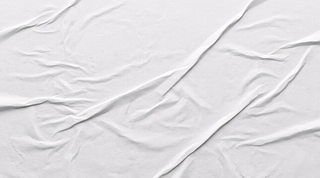 Full frame white crumpled poster paper texture backdrop.