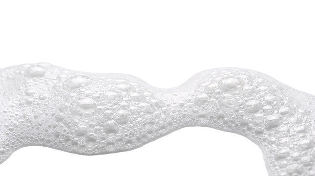 Wavy white soap foam texture with bubbles for background.