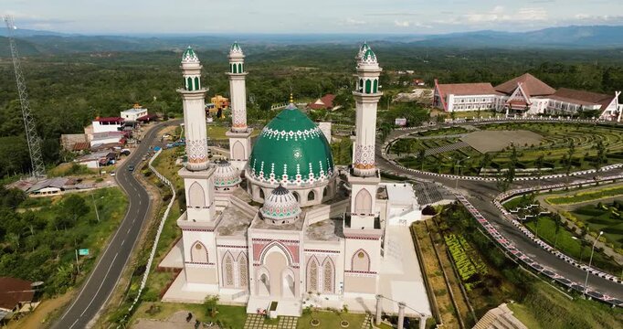 Aerial drone of beautiful mosque in Sumatra. Masjid Agung Syahrun Nur Tapanuli Selatan. Indonesia.