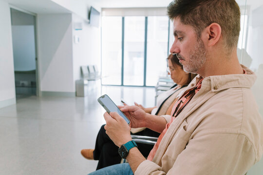 Waiting room with smartphones