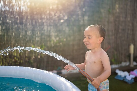 Toddler Enjoying Summer Water Play