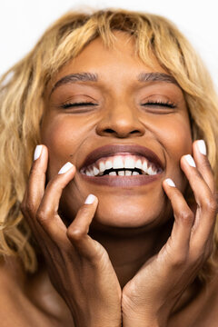 Smiling Person With Blonde Hair Enjoys Happy Moment Indoors