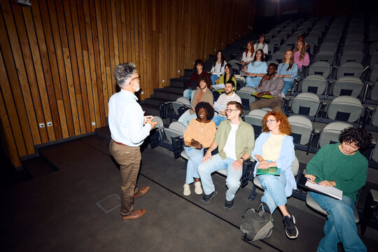 Group of Students Listening to a Speaker
