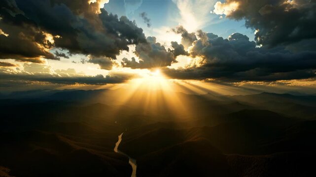Golden Sunbeams Breaking Through Storm Clouds Above a Layered Mountain Valley and Winding River, 4K Seamless Animation