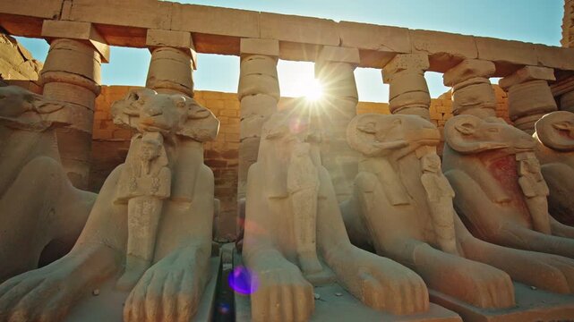 Sunlit Ram-Headed Sphinxes and Columns at Karnak Temple, Luxor