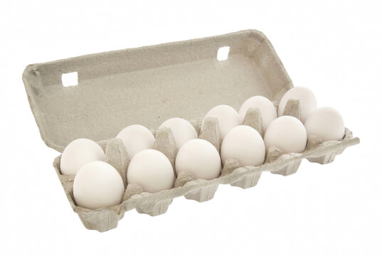 Open cardboard carton filled with twelve fresh white eggs