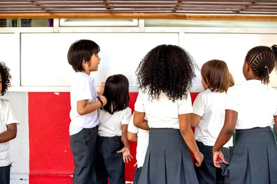 Children waiting in school line.