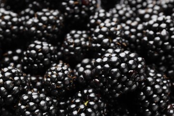 Heap of ripe tasty blackberries as background, closeup © New Africa