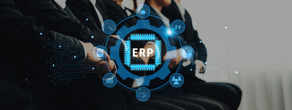 Business professionals participate in a meeting emphasizing Enterprise Resource Planning, highlighting digital technology integration for enhanced efficiency and collaboration. Trope