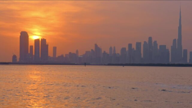 Skyline of Dubai at sunset. Time lapse