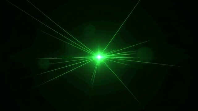 Green laser light radiating from a bright center against a black background