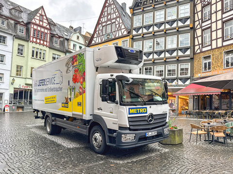 Cochem, Germany - 13 April 2026:  Delivery lorry operated by wholesaler Metro Germany stopped in the town square of Cochem which is in the Mosel Valley.