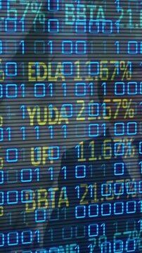 Animation of financial data over businesspeople in background
