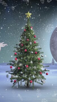 Animation of snow falling and santa claus over christmas tree in winter scenery