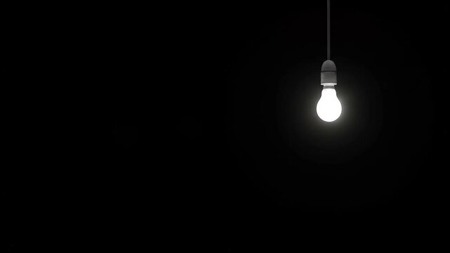 light bulb on black background