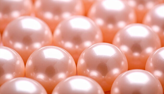 Shiny pink pearls background, elegant rose gold bead texture macro