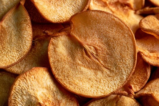 Dried apple slices arranged in neat layers for snacks or baking