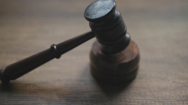 wooden judge gavel on a desk representing law and justice