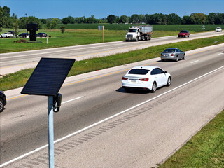 Plakat Solar powered ALPR security camera watching the community