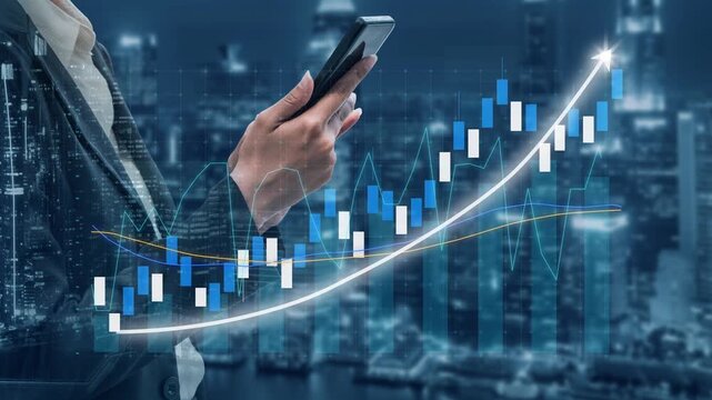 A close-up of a businessman holding a smartphone with financial graphs displayed over a vibrant cityscape, symbolizing investment growth and market analysis in contemporary finance. Copula