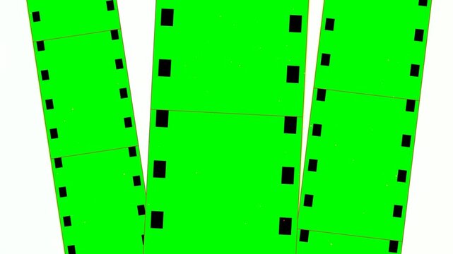 Three bright green film strips with black frames arranged for cinema design projects 4K Motion Video