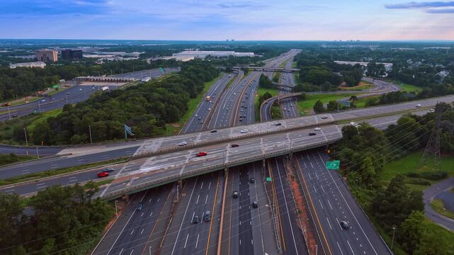 Rising over the lively multi-lane highways along the green roadsides. Revealing view on the beautiful cityscape of Middlesex County, New Jersey.