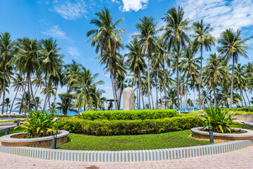 Fototapeta premium Tropical Coastal Park with Palm Trees and Garden in Nha Trang Vietnam