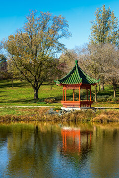 Red Pagoda On Side of Lake