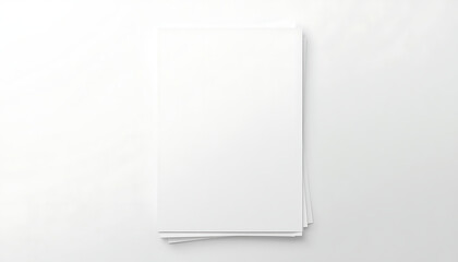 Fototapeta premium Blank white notebook or sketchbook with a spiral binding lying flat on a clean surface