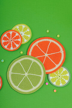 Summer crocheting concept. Handmade coral reef, marine style, underwater animals, green background
