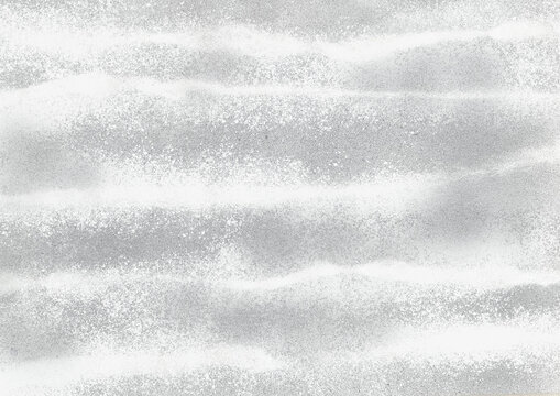 風で粉雪が舞う雪景色のイメージ