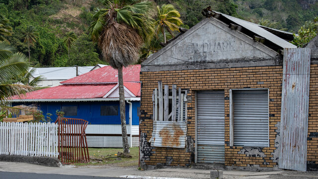 Abandoned building with windows and doors boarded up in Levuka Town on Ovalau Island in Fiji, South Pacific