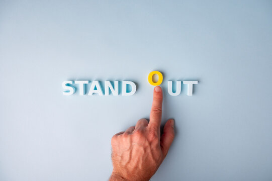 Stand out from the crowd, differentiation and uniqueness concept with highlighted letter