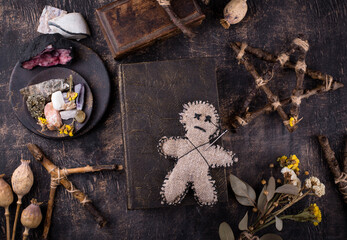 Voodoo doll. Black magic witch esoteric ritual. Halloween concept © Yulia Furman