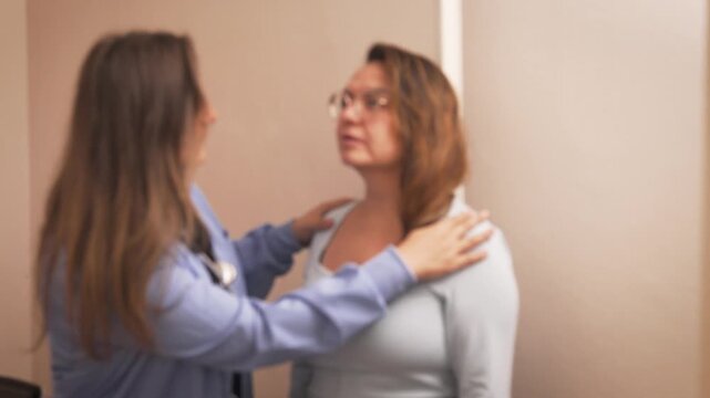 Nurse measuring patient height during medical check up